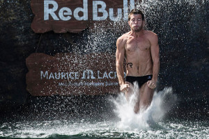 Steven Lobue of the USA dives from the 28 metre platform during the fourth stop of the Red Bull Cliff Diving World Series, Kragero, Norway on July 12th 2014. // Romina Amato/Red Bull Cliff Diving // P-20140712-00210 // Usage for editorial use only // Please go to www.redbullcontentpool.com for further information. //